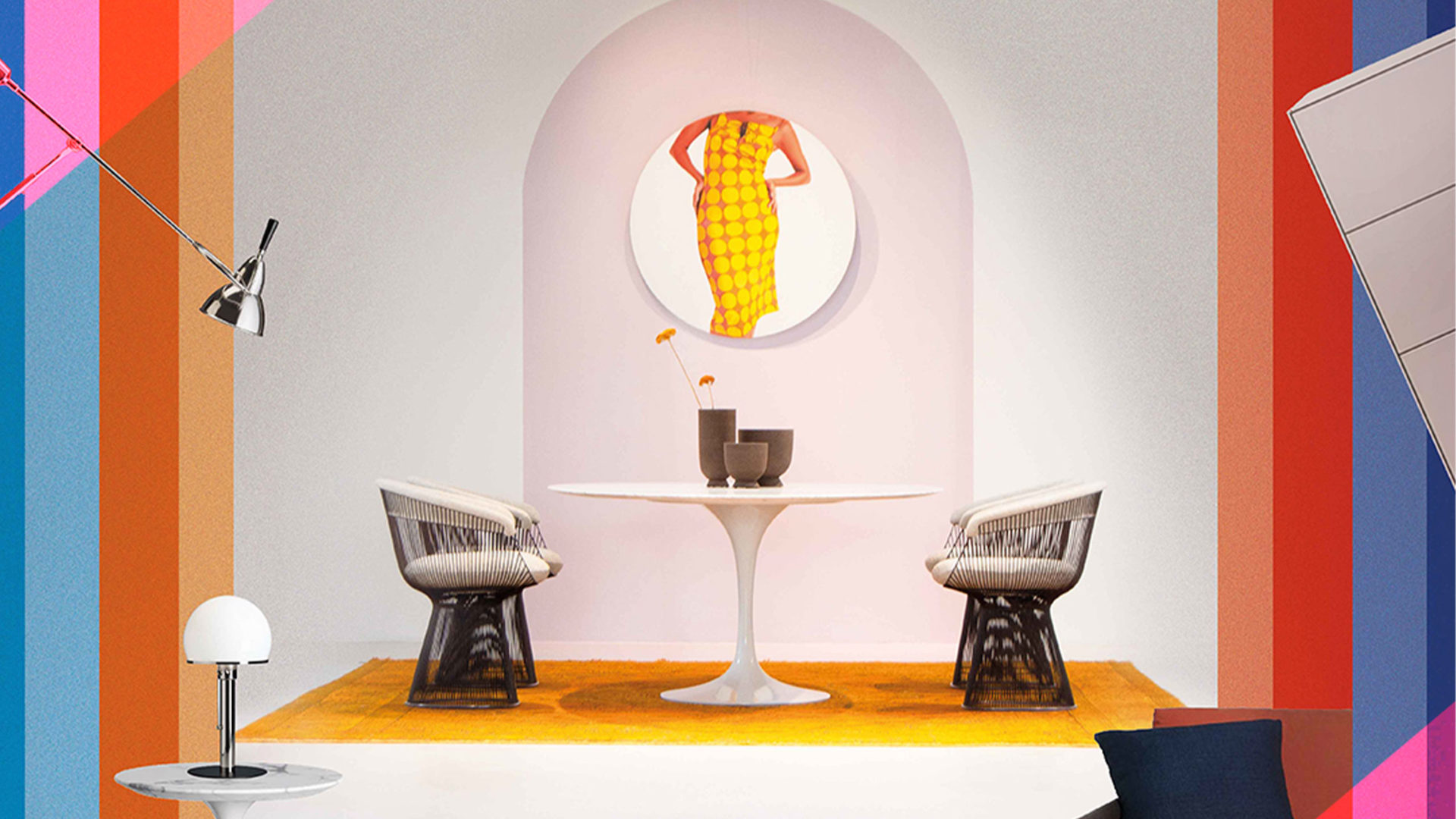 runder designertisch mit stühlen im möbel staude concept store vor einer bogen wand in rosa
