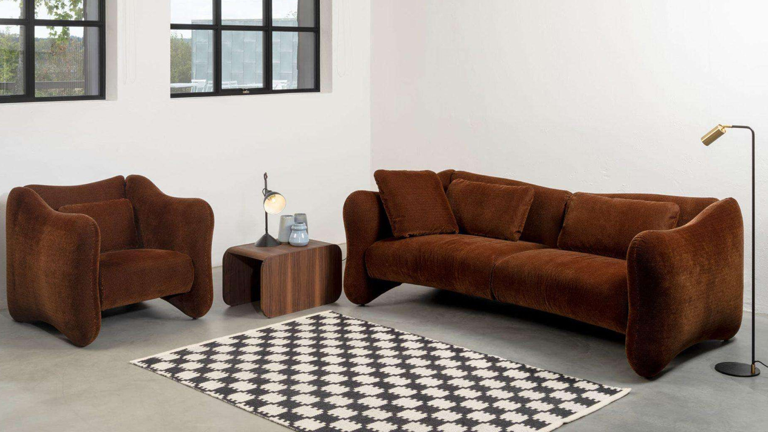 brühl bongo bay loungesofa und sessel in braun in einem minimalistischen raum