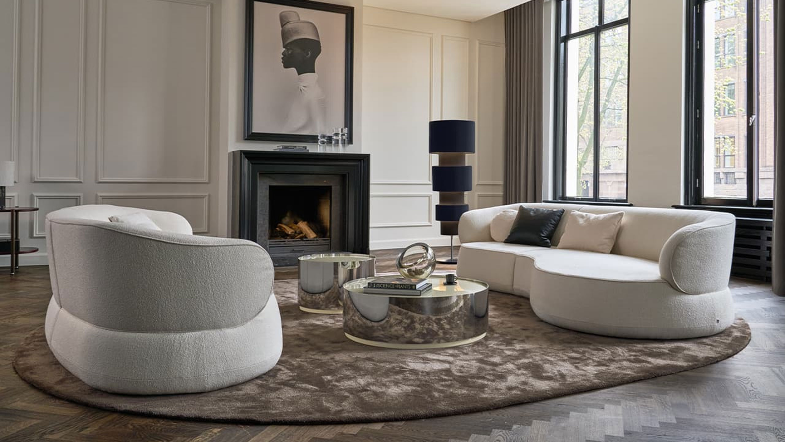 bielefelder werkstätten nimbo wohnzimmer mit organischem sofa und kamin